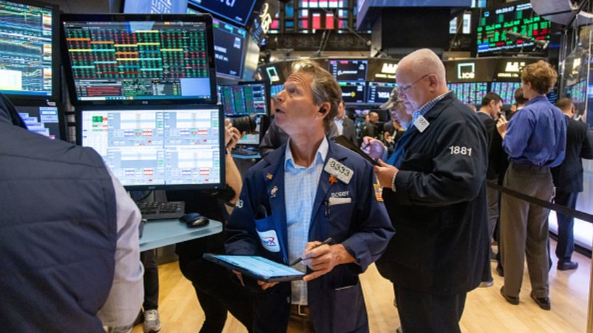 Traders work on the floor of the New York Stock Exchange on Nov. 6, 2024.