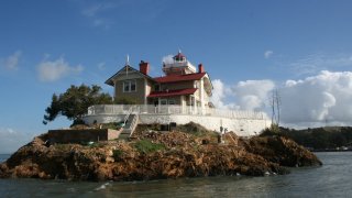 The island has a working lighthouse and five-room inn.