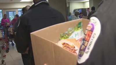 Prince George's County public safety agencies hand out food baskets to community