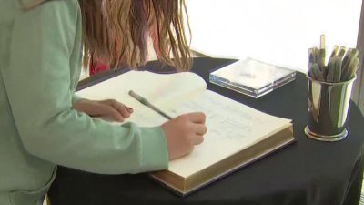 Crowds sign Jimmy Carter condolence book near White House