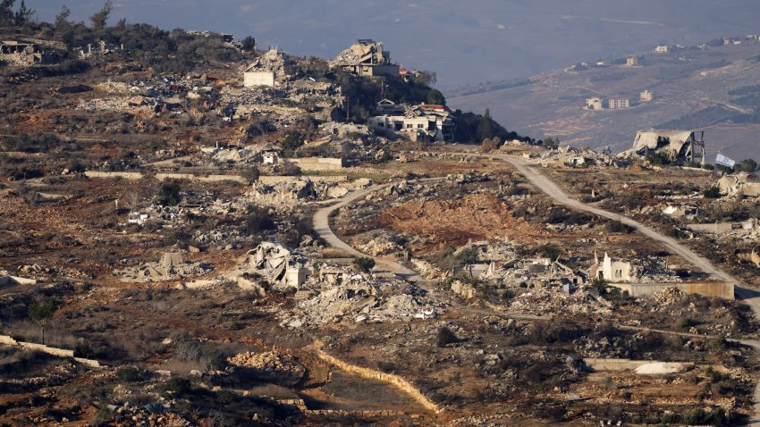 Destroyed buildings in the village of Kfar Kila, southern Lebanon, are seen from northern Israel