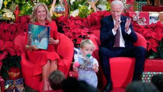 President Joe Biden and first lady Jill Biden, as she reads ‘Twas the Night Before Christmas, visit patients and families at the Children’s National Hospital in Washington, Friday, Dec. 20, 2024.