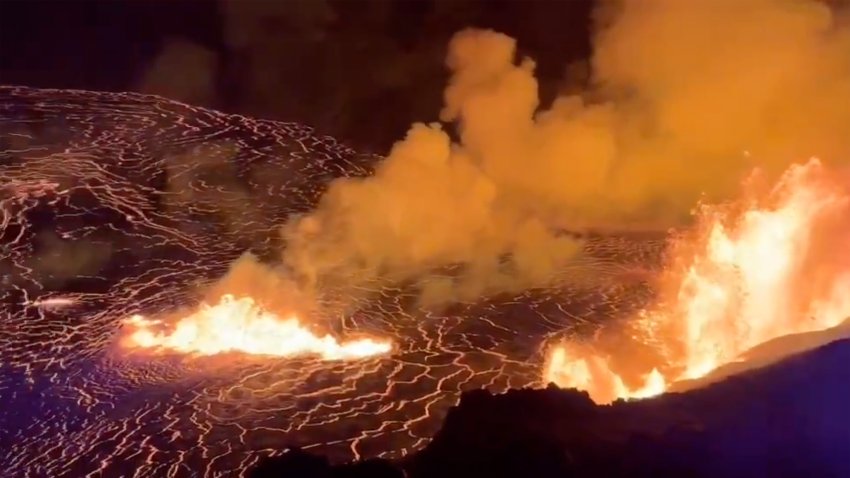 This image from video provided by the U.S. Geological Survey shows a lava lake erupting on the west caldera wall of the Kīlauea volcano in Hawaii, on Monday, Dec. 23, 2024.