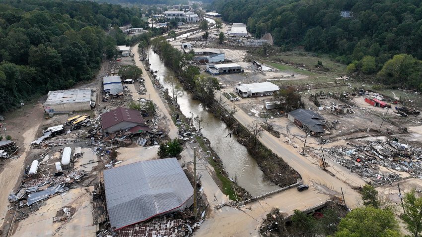 ASHEVILLE, NORTH CAROLINA – OCTOBER 03: In an aerial view, flood damage wrought by Hurricane Helene is seen along the Swannanoa River on October 3, 2024 in Asheville, North Carolina. At least 200 people were killed in six states in the wake of the powerful hurricane which made landfall as a Category 4. President Joe Biden took an aerial tour of the devastated region yesterday and ordered the deployment of 1,000 active duty U.S. soldiers to assist with storm relief efforts and reinforce the North Carolina National Guard.  (Photo by Mario Tama/Getty Images)