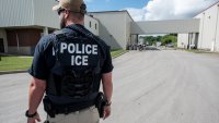 US Immigration and Customs Enforcement’s (ICE) special agent preparing to arrest alleged immigration violators at Fresh Mark, Salem, June 19, 2018. Image courtesy ICE ICE / U.S. Immigration and Customs Enforcement.