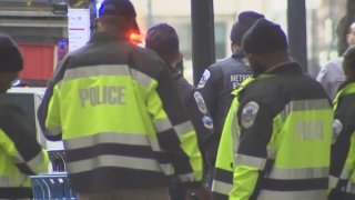 Police officers respond after a suspect stabbed a Metro officer in D.C. on Dec. 17, 2024.