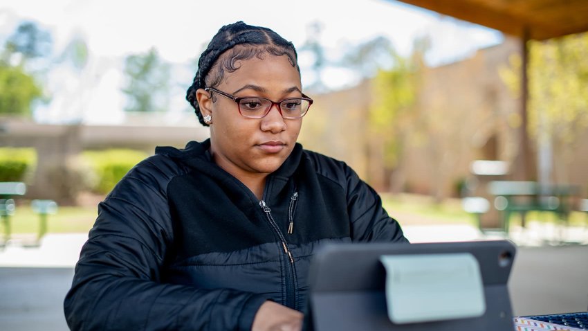 Student studying on campus