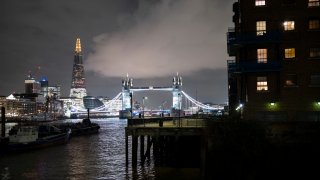 Night view looking across the River Thames to the skyline of Tower Bridge and The Shard on 3rd December 2024 in London, United Kingdom. 