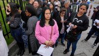 Gloria Camacho holds a notification stating her visa appointment was canceled, due to Colombian President Gustavo Petro’s refusal to accept repatriation flights of Colombian citizens from the U.S., outside the U.S. embassy in Bogota, Colombia, Monday, Jan. 27, 2025.