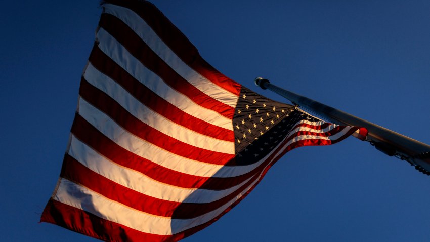 The US flag at half-staff at the base of the Washington Monument in Washington, DC, US, on Tuesday, Dec. 31, 2024. Jimmy?Carter, the former Georgia peanut farmer who as president brokered a historic and lasting peace accord between Israel and Egypt in a single term marred by soaring inflation, an oil shortage and Iran’s holding of American hostages, died Sunday at 100 years of age. Photographer: Samuel Corum/Bloomberg via Getty Images