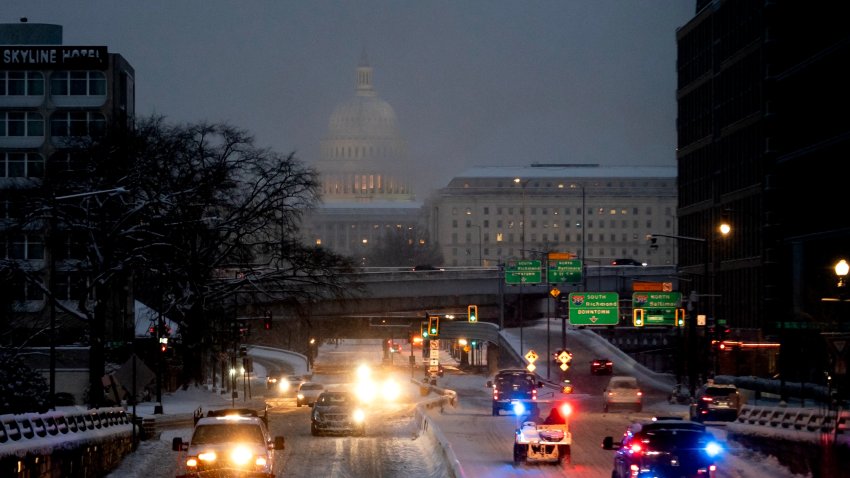 A snow plow and police vehicles near the US Capitol in Washington, DC, US, on Monday, Jan. 6, 2025. Snow is piling up in Washington, shutting down federal offices and schools, as a winter storm that has snarled air and road traffic and knocked out power in six states makes its way east. Photographer: Stefani Reynolds/Bloomberg via Getty Images