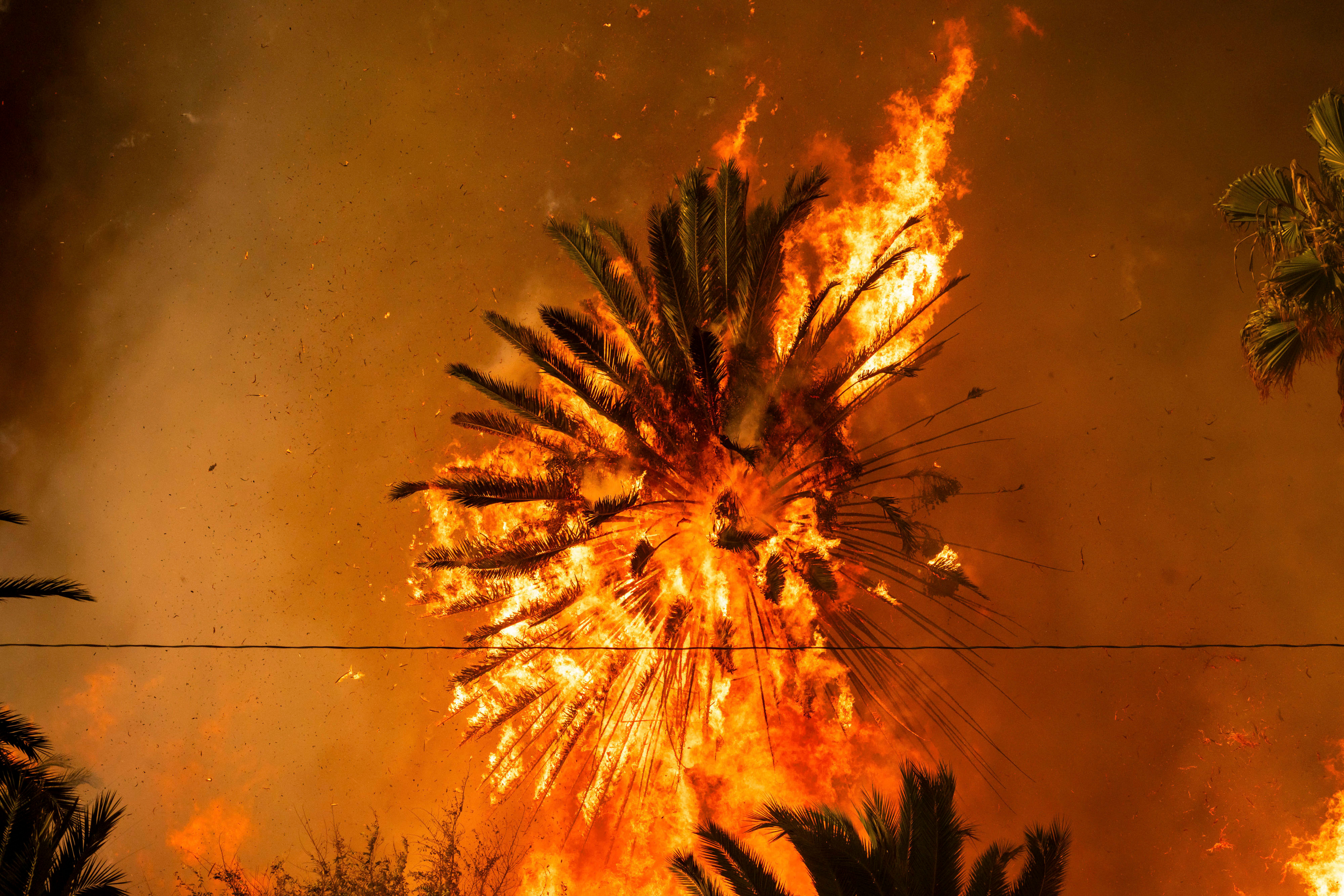 Images: Wildfires race across Southern California