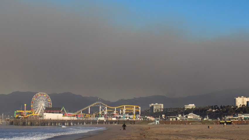 Wildfire smoke from the Palisades Fire is seen from Santa Monica Pier