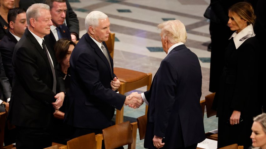 U.S. President-elect Donald Trump greets former U.S. Vice President Mike Pence as he arrives with Melania Trump as former U.S. Vice President Al Gore looks on during the state funeral for former U.S. President Jimmy Carter at Washington National Cathedral on January 09, 2025 in Washington, DC. (Photo by Chip Somodevilla/Getty Images)