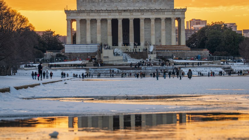 WASHINGTON, DC – JANUARY 12: Sunset behind the Lincoln Memorial is reflected in a puddle on the frozen surface of the Lincoln Memorial Reflecting Pool on the National Mall on January 12, 2025, in Washington, DC. (Photo by J. David Ake/Getty Images)