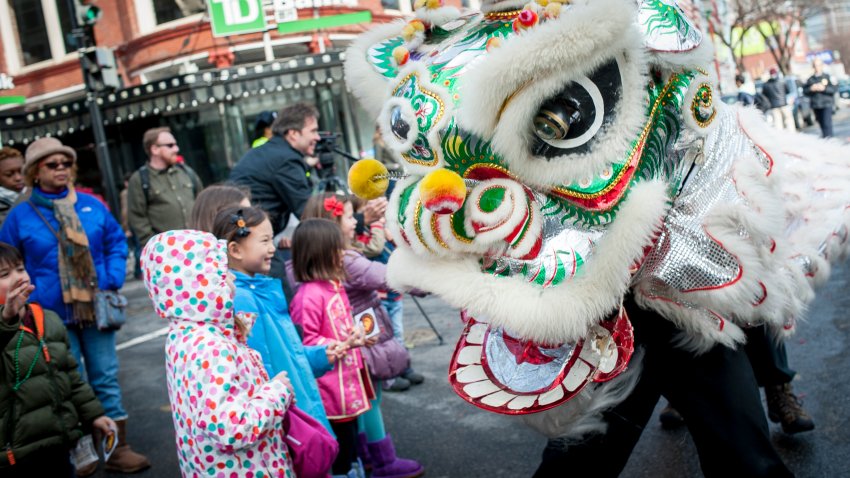 WASHINGTON, D.C. – FEBRUARY 22: Chinese dragons entertain spectators as the Chinese New Years parade makes its way down Eye Street during the  Chinese New Year Parade in Chinatown on February 22, 2015 in Washington, DC. The event features the traditional Chinese Dragon Dance, Kung Fu demonstrations and live musical entertainment. This is the year of the Goat. (Photo by Pete Marovich For The Washington Post via Getty Images)