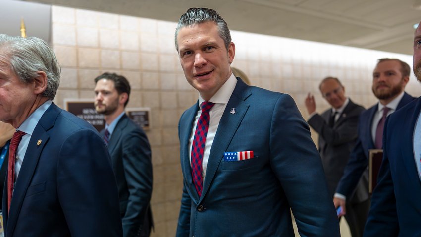 FILE - Pete Hegseth, President-elect Donald Trump's nominee for defense secretary, walks to meet with senators at the Capitol in Washington, Dec. 17, 2024.