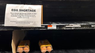 Sign on an empty supermarket shelf in Queens, New York.