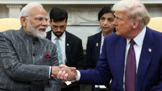 U.S. President Donald Trump and Indian Prime Minister Narendra Modi shake hands, at the White House in Washington, D.C., U.S., Feb. 13, 2025. 