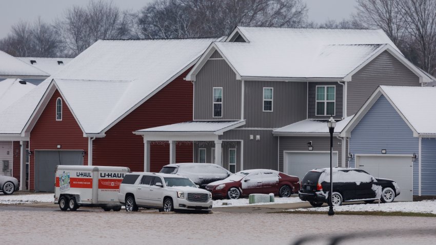 File. FEBRUARY 16: A vehicle makes its way through a flooded housing development after a rain storm on February 16, 2025 outside of Bowling Green, Kentucky. Severe winter storms brought torrential rains causing intense flooding in Kentucky and parts of Florida and Georgia.