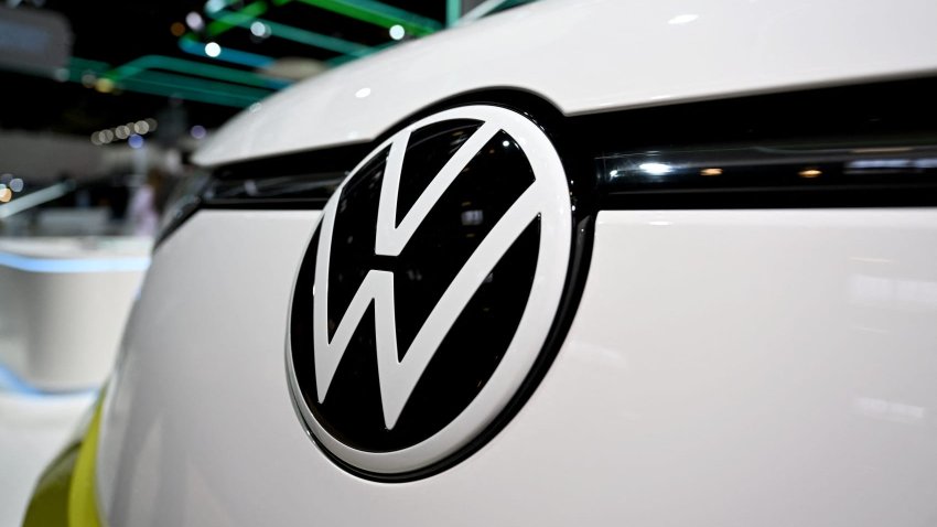 The logo of German car maker Volkswagen (VW) is seen on the front of a Volkswagen ID. Buzz Pro electric van at the International Motor Show (IAA) in Munich, southern Germany, on September 5, 2023.