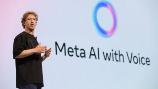 Meta CEO Mark Zuckerberg holds a smartphone as he makes a keynote speech at the Meta Connect annual event at the company’s headquarters in Menlo Park, California, on Sept. 25, 2024.