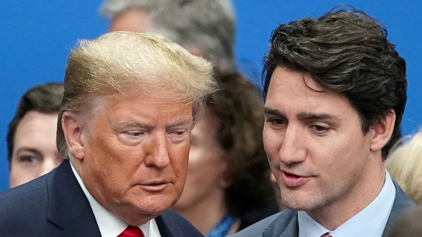 FILE PHOTO: U.S. President Donald Trump talks with Canada’s Prime Minister Justin Trudeau during a North Atlantic Treaty Organization Plenary Session at the NATO summit in Watford, Britain, December 4, 2019. 