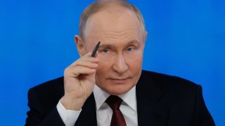 Russian President Vladimir Putin winks during his annual televised year-end press conference and phone-in held in Moscow, Russia December 19, 2024. 
