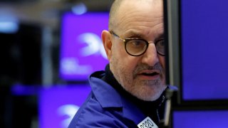 A trader works on the floor at the New York Stock Exchange (NYSE) in New York City, U.S., February 24, 2025. REUTERS/Brendan McDermid