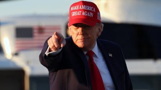 U.S. President Donald Trump gestures as he walks to board Air Force One to depart Washington from Joint Base Andrews in Maryland, Feb. 28, 2025. 