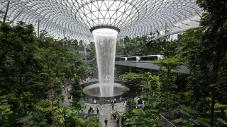 Tourists visit the Jewel Changi Airport in Singapore on Sept. 7, 2023.