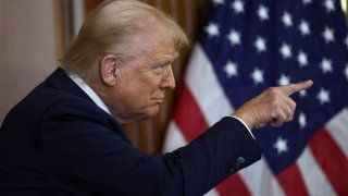 U.S. President Donald Trump points as he attends the annual Friends of Ireland luncheon hosted by U.S. House of Representatives Speaker Mike Johnson (R-LA) at the U.S. Capitol in Washington, D.C., U.S., March 12, 2025. 