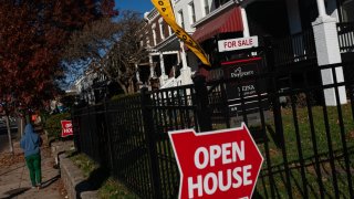 FILE PHOTO: An “Open House” sign outside of a home in Washington, DC, US, on Sunday, Nov. 19, 2023. 