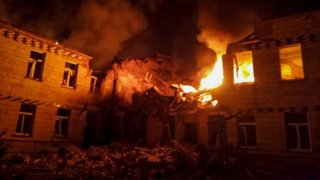 Officials work at the site of destruction and fire after the Russian attack in Sumy, Ukraine on March 19, 2025. 