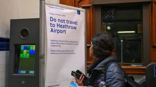 A reads “Do Not Travel To Heathrow Airport” at Hounslow Central London Underground station on March 21, 2025. 
