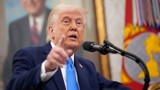 U.S. President Donald Trump announces that his administration has reached a deal with elite law firm Skadden, Arps, Slate, Meagher & Flom during a swearing-in ceremony in the Oval Office at the White House on March 28, 2025 in Washington, DC. 