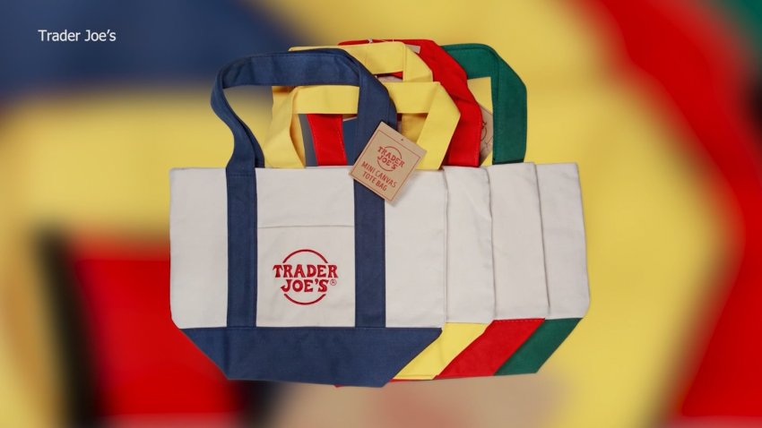 A product shot of four Trader Joe's tote bags.