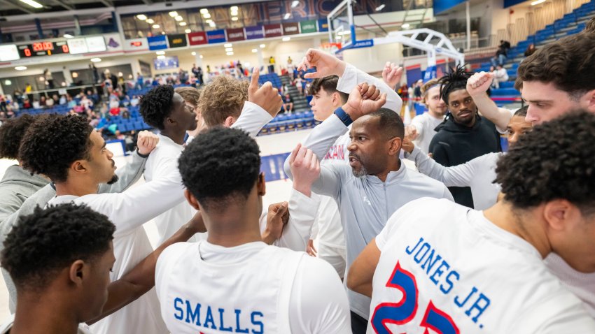 WASHINGTON, DC – FEBRUARY 26: American University Coach Duane Simpkins rallies players during a basketball game against Navy in Washington, DC on February 26, 2025. (Photo by Craig Hudson for The Washington Post via Getty Images)