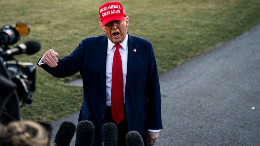 US President Donald Trump speaks to members of the media on the South Lawn of the White House