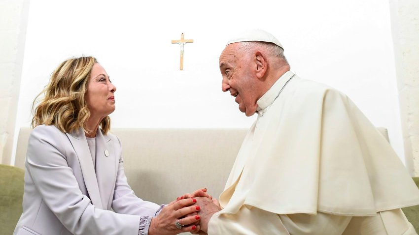 Italian Premier Giorgia Meloni receives Pope Francis as he arrives at the G7 Leaders Summit on day two of the 50th G7 summit at Borgo Egnazia on June 14, 2024 in Fasano, Italy.