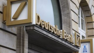 A sign for Deutsche Bank AG at a bank branch in the financial district of Frankfurt, Germany, on Thursday, Feb. 2, 2023.