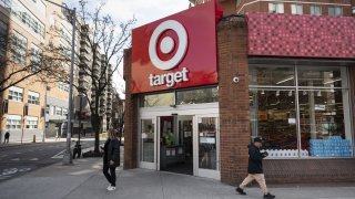 People walk past Target Store in Midtown Manhattan on March 6, 2025 in New York City, United States.