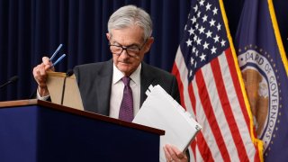 Federal Reserve Chairman Jerome Powell leaves after delivering remarks at a news conference following a Federal Open Market Committee (FOMC) meeting at the Federal Reserve on March 19, 2025 in Washington, DC.