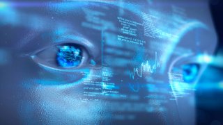 Artificial intelligence robot looking at futuristic digital data display.