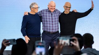 Former Microsoft CEOs Bill Gates, left, and Steve Ballmer, center, pose for photos with CEO Satya Nadella during an event celebrating the 50th Anniversary of Microsoft on April 4, 2025 in Redmond, Washington.