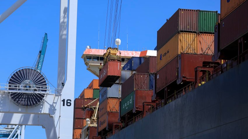 MIAMI, FLORIDA – APRIL 15: Shipping containers are stacked on a cargo ship as they are offloaded at PortMiami on April 15, 2025 in Miami, Florida. U.S. President Donald Trump is reportedly considering at least 15 trade deals as countries react to his implementation of wide-ranging tariffs. (Photo by Joe Raedle/Getty Images)