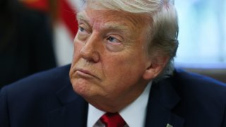 U.S. President Donald Trump looks on, on the day he signs executive orders in the Oval Office at the White House in Washington, D.C., U.S., April 23, 2025.