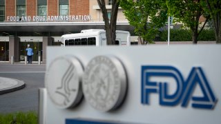 FILE - A sign for the Food and Drug Administration outside of the headquarters on July 20, 2020, in White Oak, Maryland.