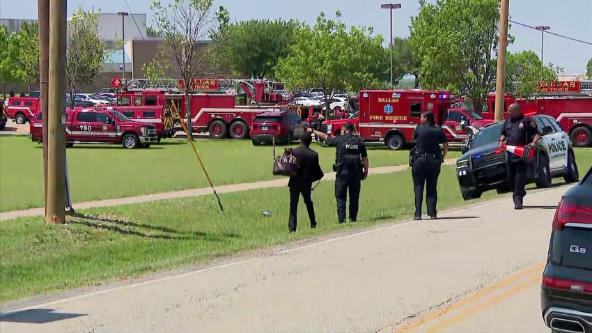 Dallas police, Dallas ISD police and Dallas fire respond to a shooting at Wilmer-Hutchins High School on Tuesday, April 15, 2025.
