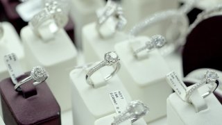Diamond rings and bracelets on display in a show window in Antwerp, Belgium. (Photo by Yuriko Nakao/Getty Images)